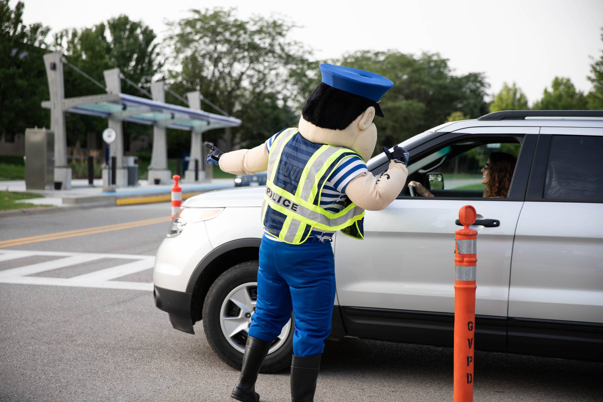 louie directing traffic